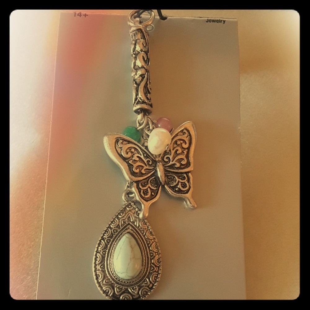 Ornate antique teardrop and Butterfly pendant